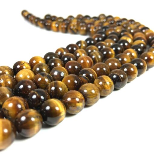 Shop 10mm Natural Tiger Eye Smooth Round Beads