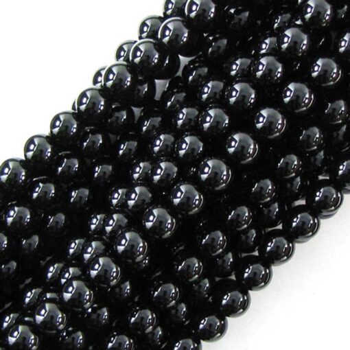 Shop 10mm Natural Black Onyx Smooth Round Beads