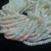 Shop Natural White Milky Ethiopian Opal Smooth Rondelle Beads