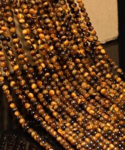 Shop 4mm Natural Tiger Eye Smooth Round Beads