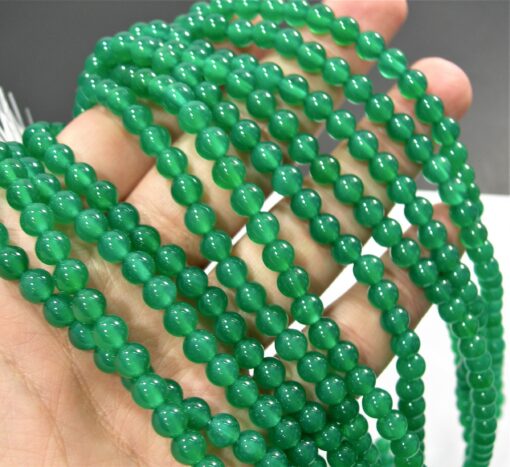 Shop 6mm Natural Green Onyx Smooth Round Beads