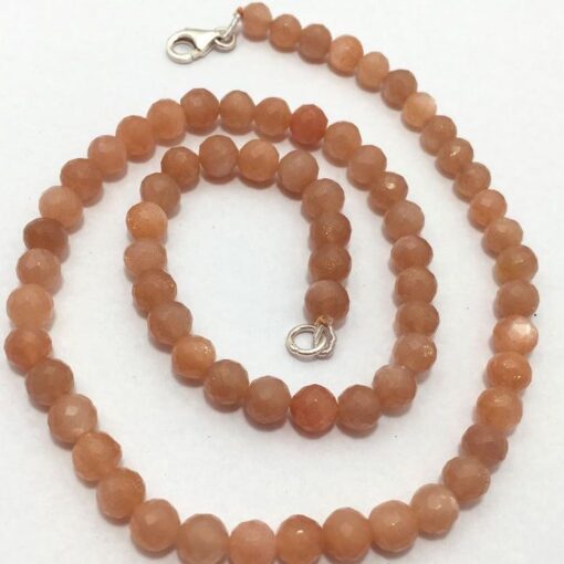 Shop Peach Moonstone Faceted Round Beads Strand