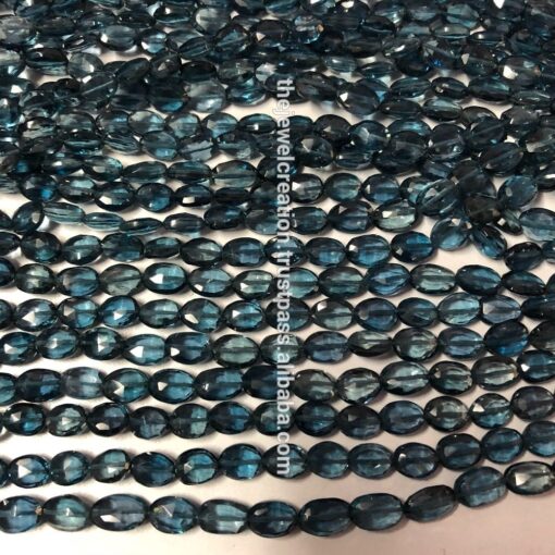 Shop London Blue Topaz Faceted Oval Beads Strand