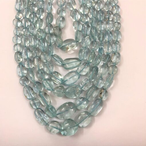 Shop Blue Aquamarine Smooth Tumble Nuggets Beads