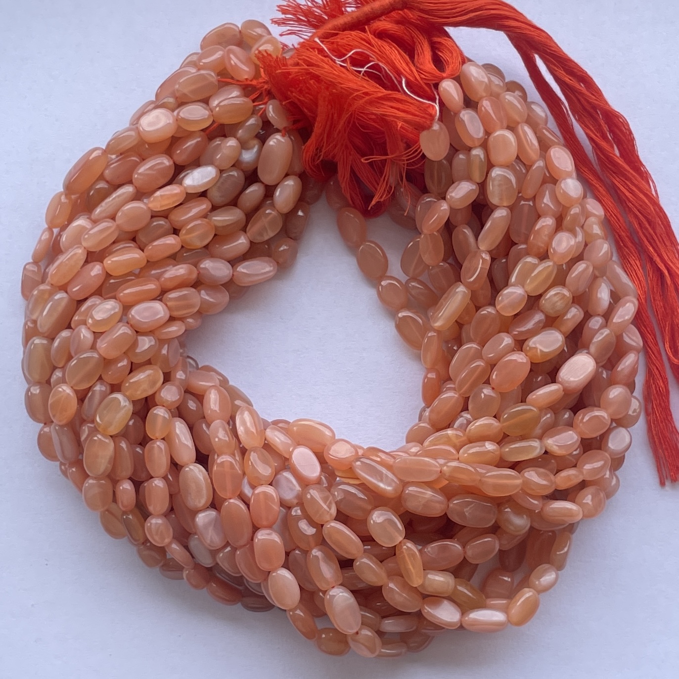 Natural Peach Moonstone Smooth Oval Beads Strand Natural Peach Moonstone Smooth Oval Beads Strand