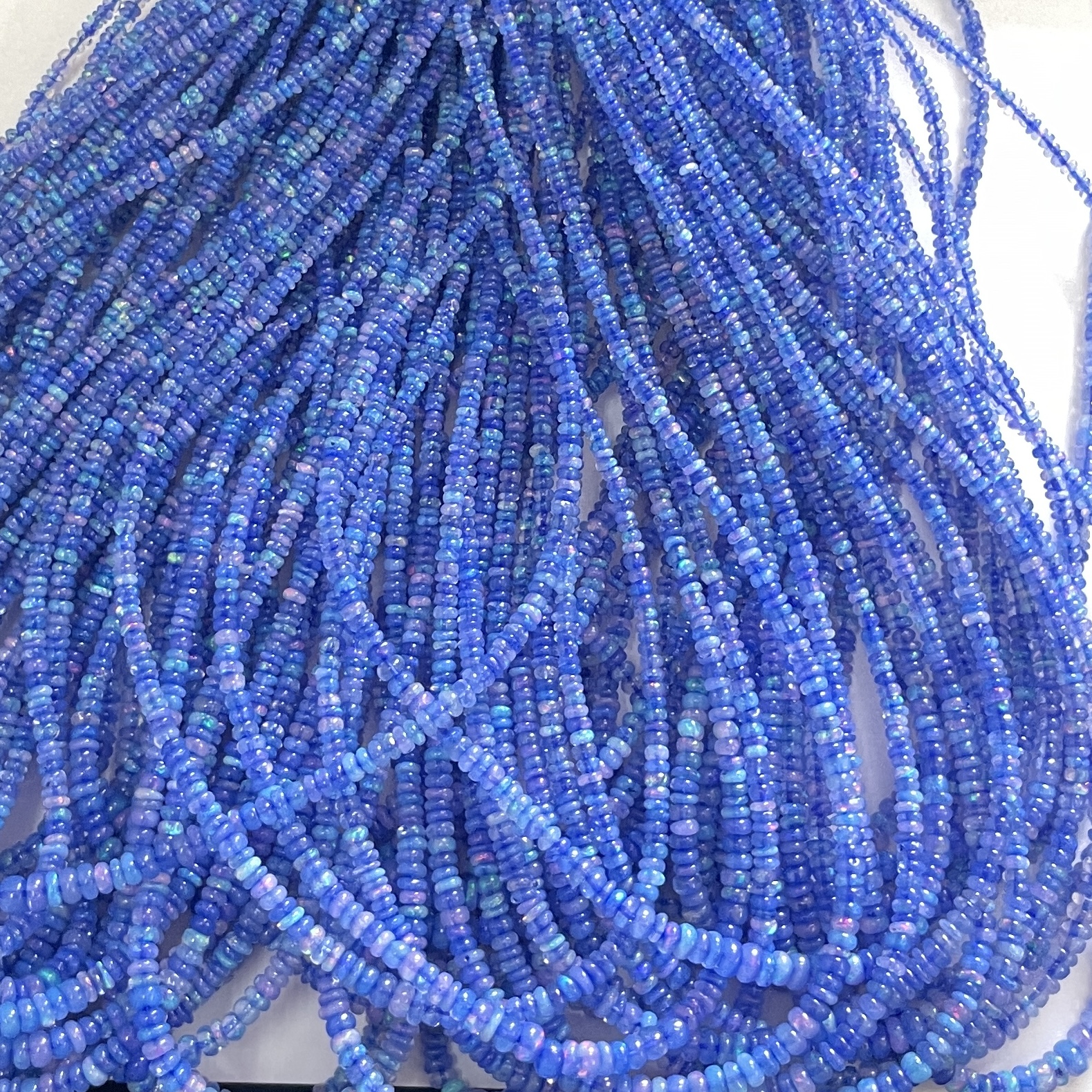 Natural Tanzanite Blue Ethiopian Opal Smooth Rondelle Beads Strand Natural Tanzanite Blue Ethiopian Opal Smooth Rondelle Beads Strand