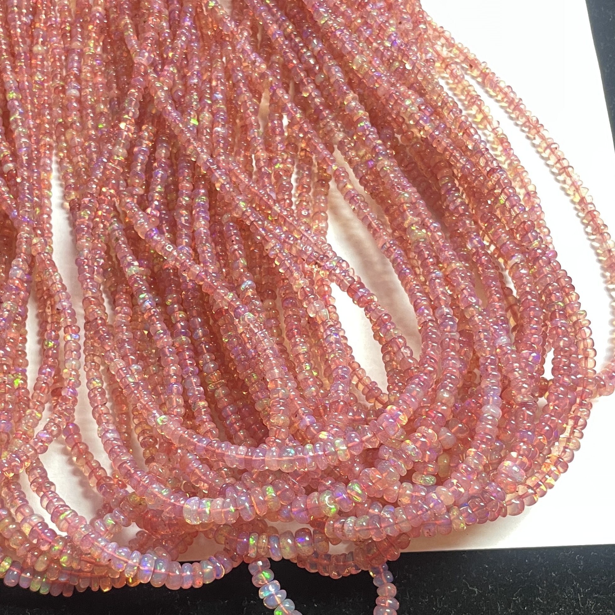 Natural Rose Pink Ethiopian Opal Smooth Rondelle Beads Strand Natural Rose Pink Ethiopian Opal Smooth Rondelle Beads Strand
