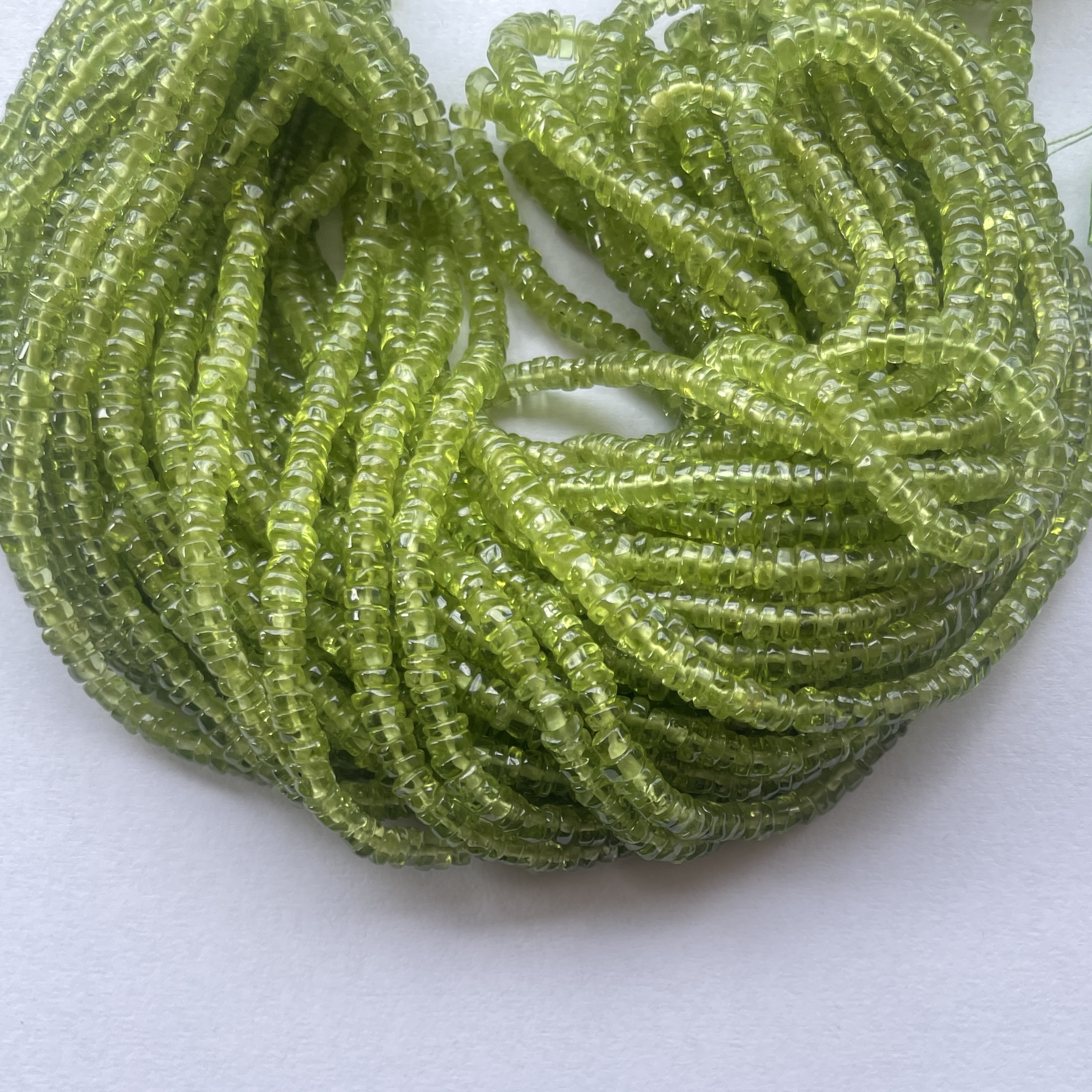 Shop 5mm 6mm Natural Peridot Stone Smooth Heishi Tyre Beads Strand Shop 5mm 6mm Natural Peridot Stone Smooth Heishi Tyre Beads Strand
