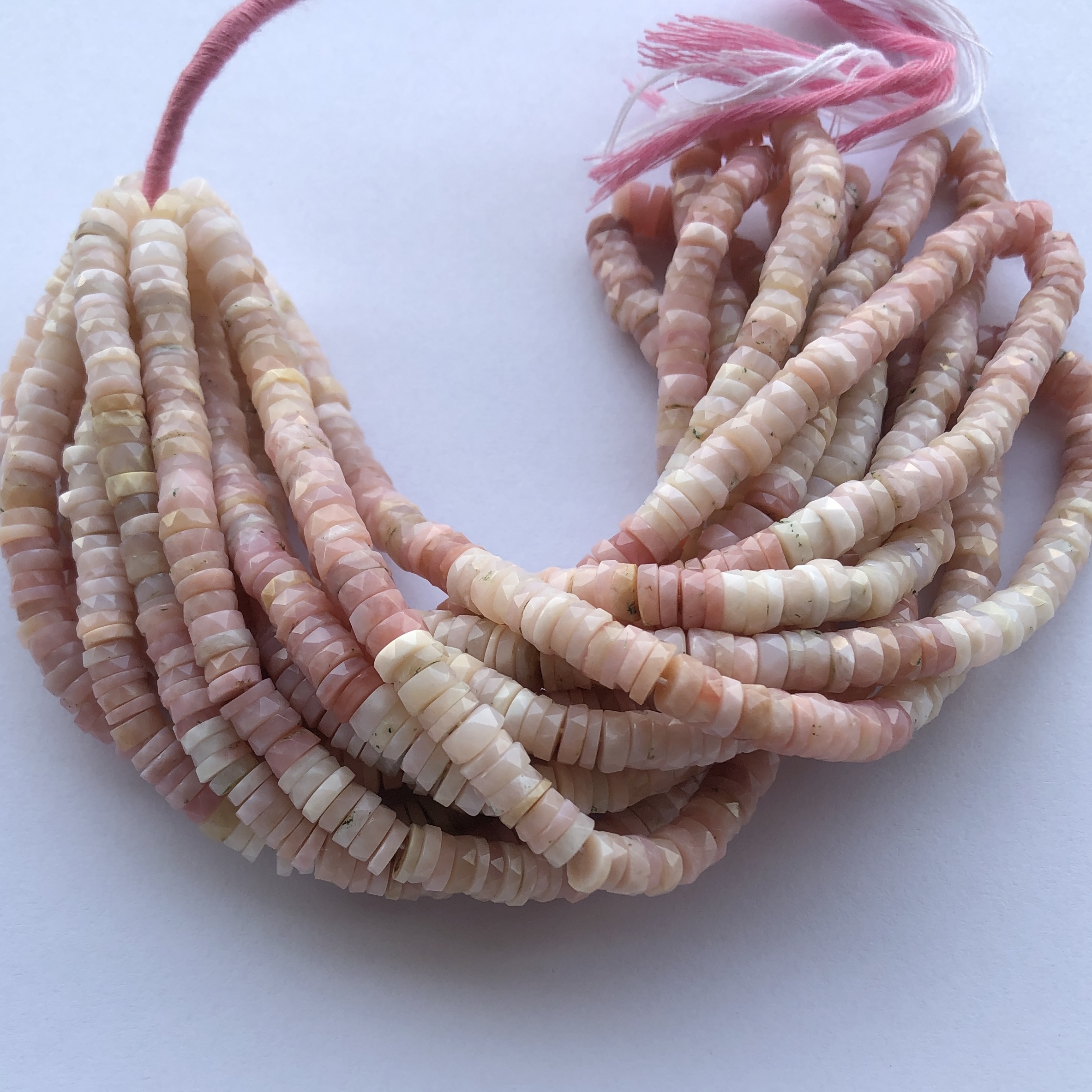 Shop 6mm 8mm Peruvian Pink Opal Stone Faceted Heishi Tyre Beads Strands Shop 6mm 8mm Peruvian Pink Opal Stone Faceted Heishi Tyre Beads Strands