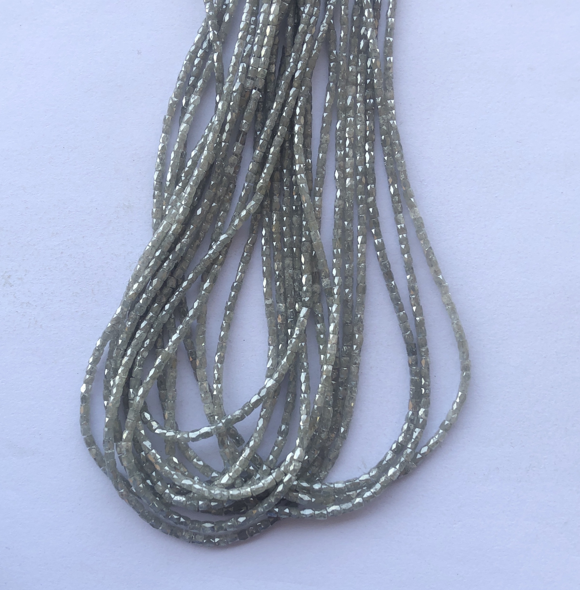 Shop 2mm 4mm Natural Gray Diamond Faceted Pipe Shape Beads Strand Shop 2mm 4mm Natural Gray Diamond Faceted Pipe Shape Beads Strand