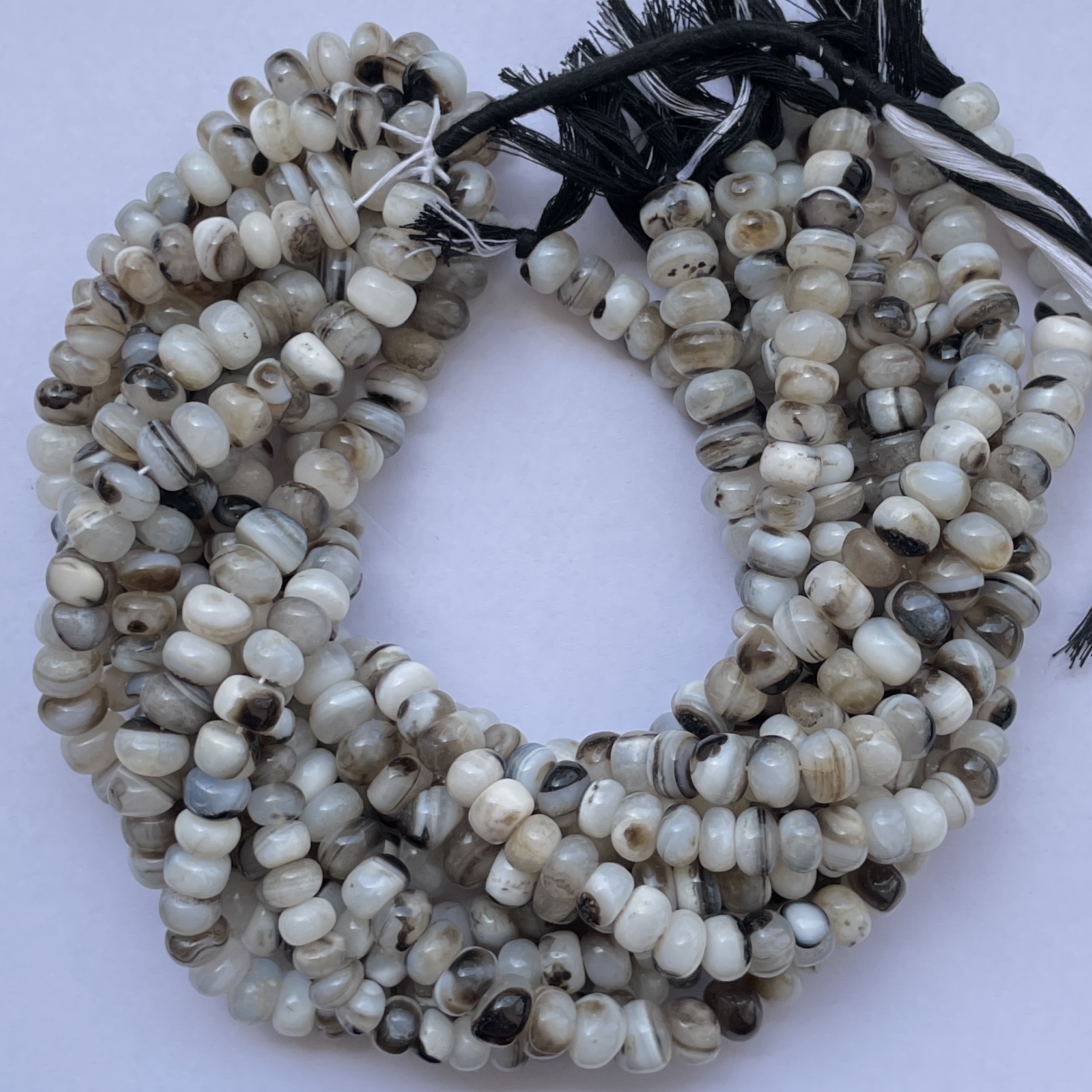 Shop 6mm 8mm Banded White Onyx Smooth Rondelle Beads Shop 6mm 8mm Banded White Onyx Smooth Rondelle Beads