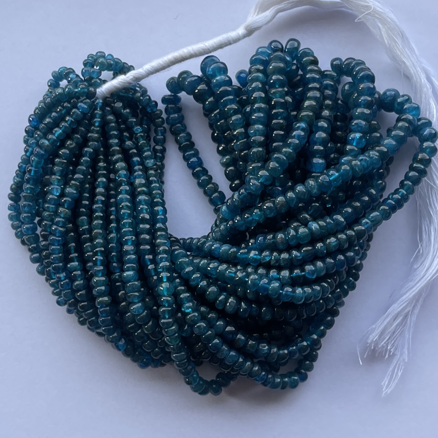 Shop 4mm 6mm Natural Neon Apatite Smooth Rondelle Beads Shop 4mm 6mm Natural Neon Apatite Smooth Rondelle Beads