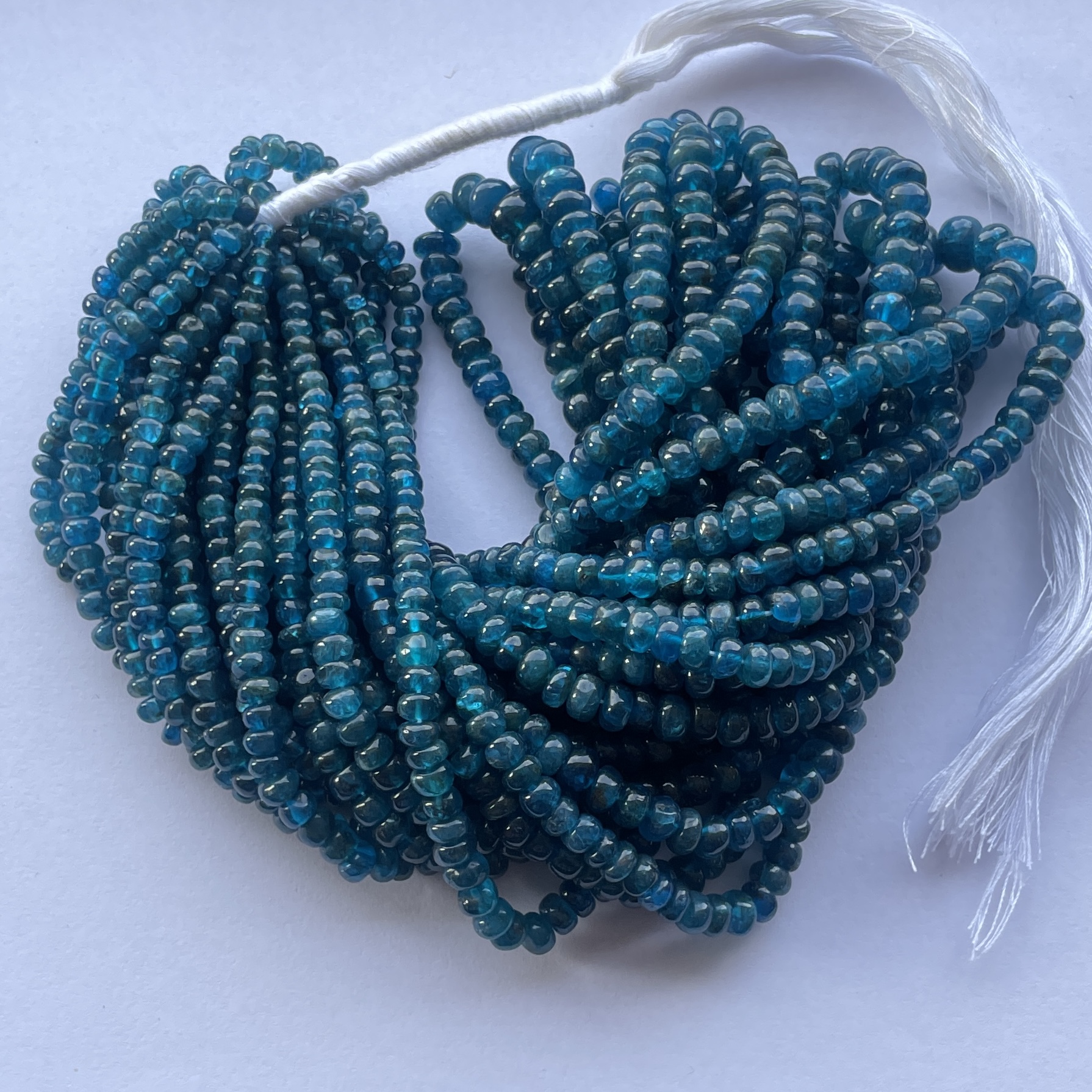 Shop 4mm 6mm Natural Neon Apatite Smooth Rondelle Beads Shop 4mm 6mm Natural Neon Apatite Smooth Rondelle Beads