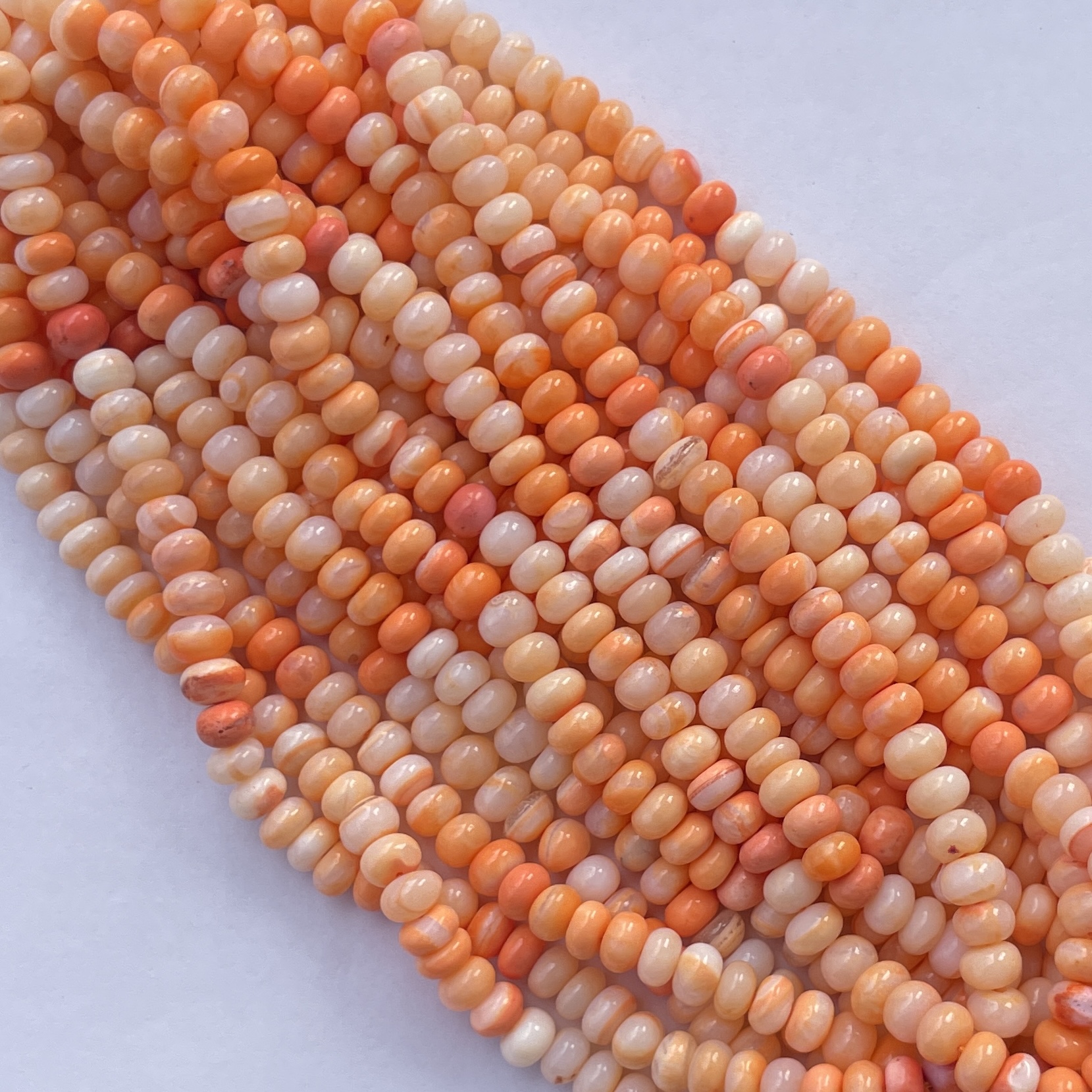 Shop 6mm 8mm Natural Orange Opal Smooth Rondelle Beads Shop 6mm 8mm Natural Orange Opal Smooth Rondelle Beads