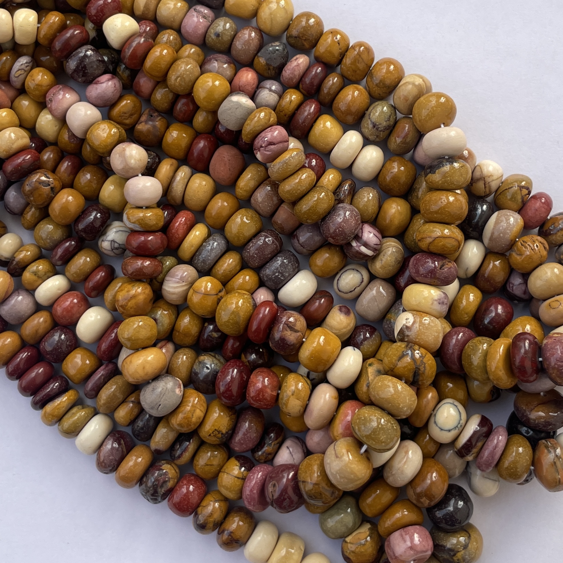 Shop 6mm 8mm Natural Mookaite Smooth Rondelle Beads Strand Shop 6mm 8mm Natural Mookaite Smooth Rondelle Beads Strand