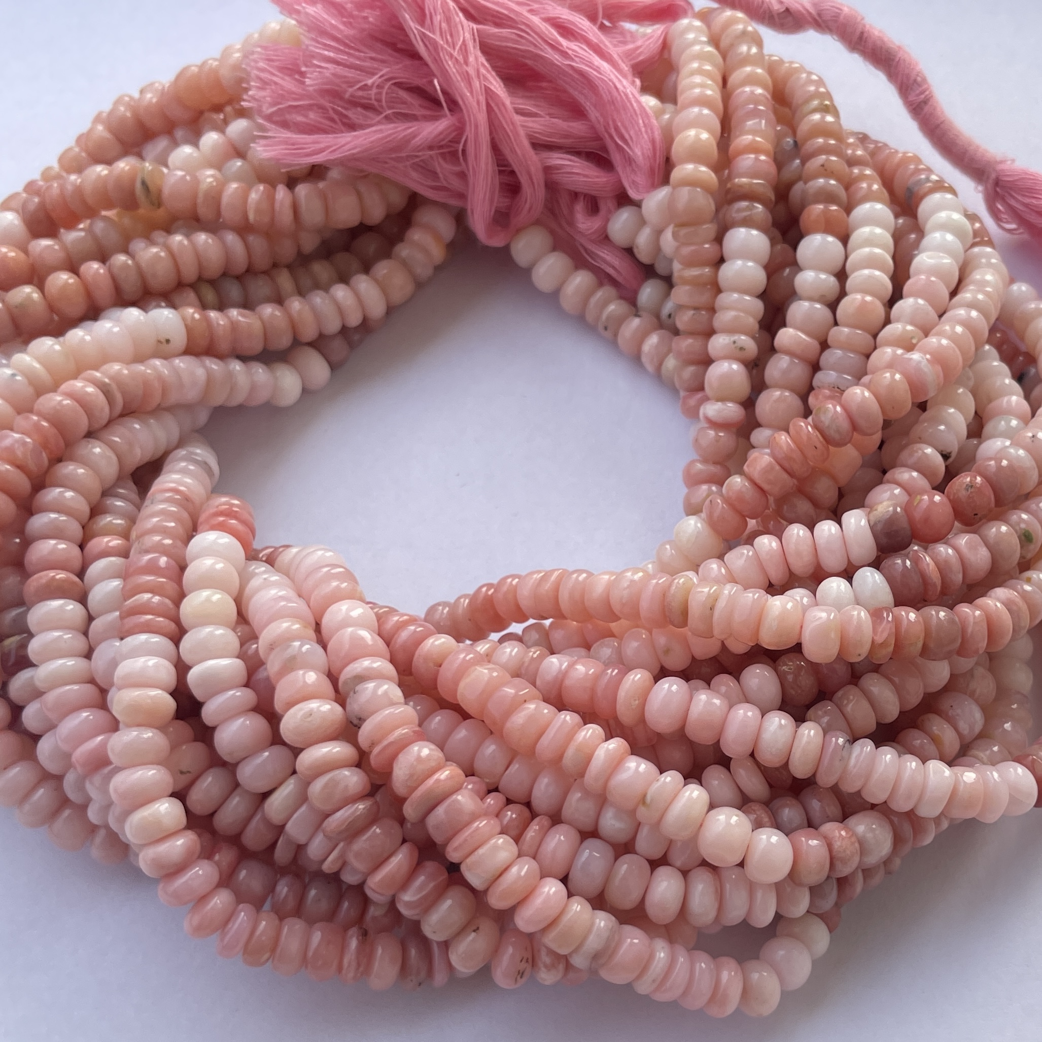 Shop 6mm 8mm Peruvian Ombre Pink Opal Rondelle Beads Shop 6mm 8mm Peruvian Ombre Pink Opal Rondelle Beads