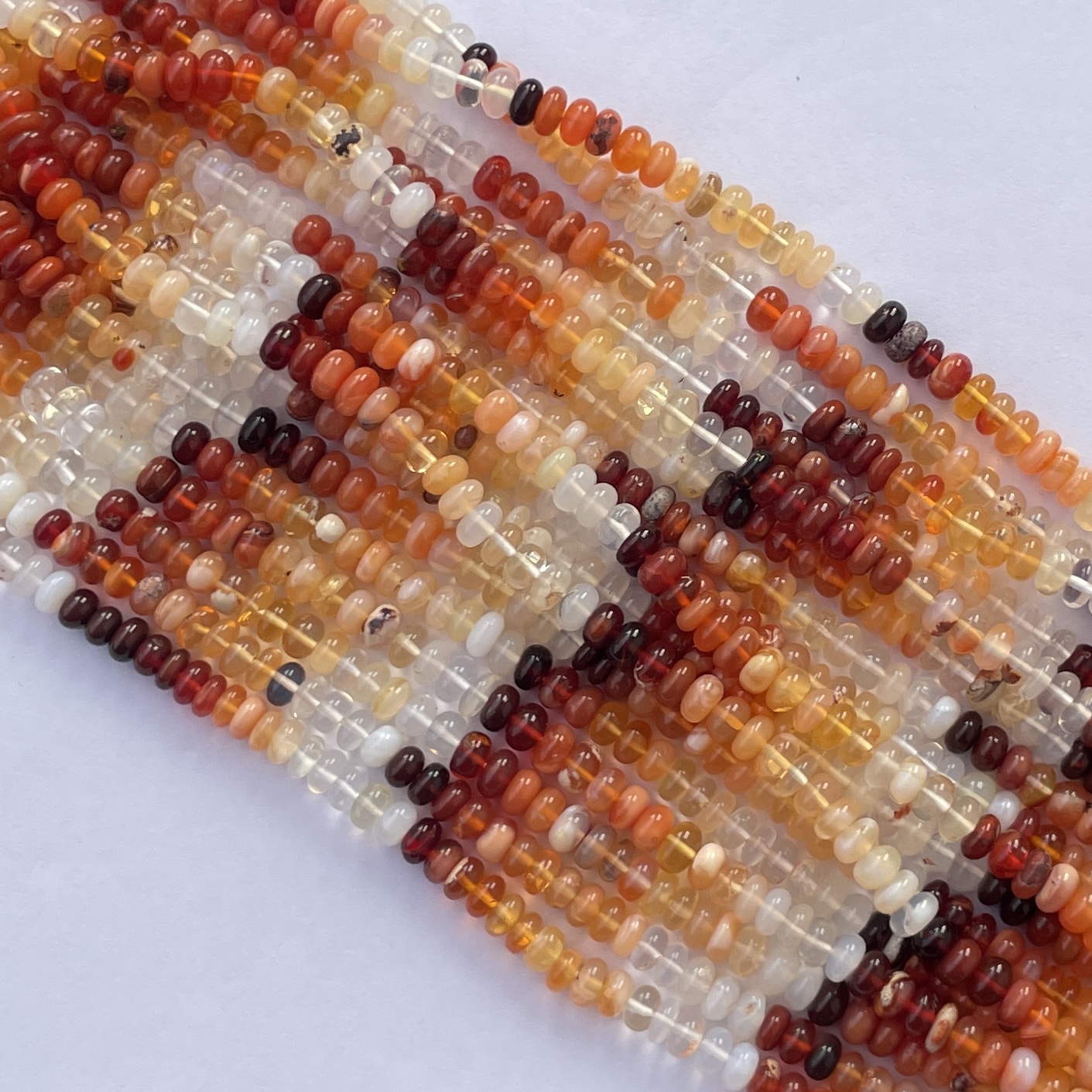 Shop 6mm 8mm Mexican Fire Opal Smooth Rondelle Beads Shop 6mm 8mm Mexican Fire Opal Smooth Rondelle Beads